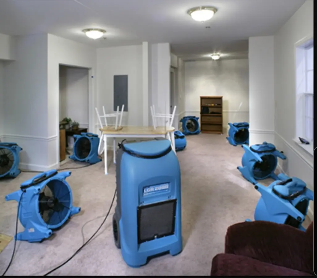Air movers and dehumidifier setup for Water Damage Restoration in Calera